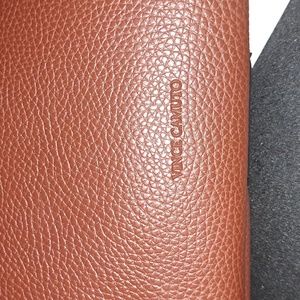 Vince Camuto brown with middle black stripe all leather.